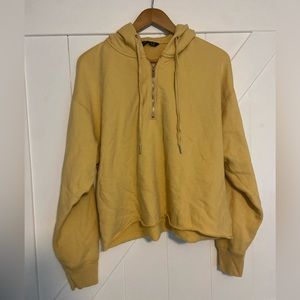 Yellow Abercrombie & Fitch half zip cropped hoodie.